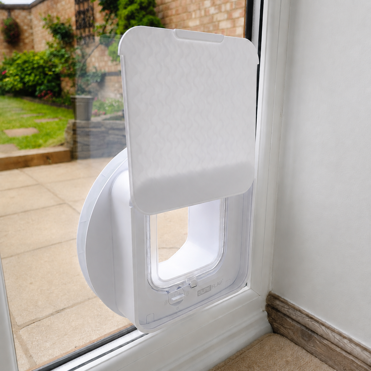 SureFlap Microchip Cat Flap with its sliding cover half open